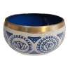 Handcrafted Tibetan meditation bowl with intricate designs, producing a calming sound for relaxation and mindfulness. Ideal for meditation, yoga, and spiritual practices.