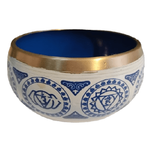 Handcrafted Tibetan meditation bowl with intricate designs, producing a calming sound for relaxation and mindfulness. Ideal for meditation, yoga, and spiritual practices.