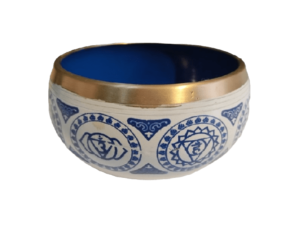 Handcrafted Tibetan meditation bowl with intricate designs, producing a calming sound for relaxation and mindfulness. Ideal for meditation, yoga, and spiritual practices.