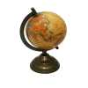 Antique globe featuring a detailed, vintage map with classic cartographic elements and an ornate brass stand. The globe showcases rich, historical colors and intricate geographical details, evoking a sense of timeless exploration and elegance.