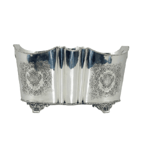 Large silver ice bucket with elegant design and polished finish, ideal for upscale events and keeping drinks chilled.