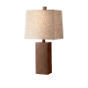 Table lamp with a rustic wooden base and a warm, textured lampshade. The wooden base features natural grain patterns, adding a touch of classic charm and earthy elegance to any room decor.
