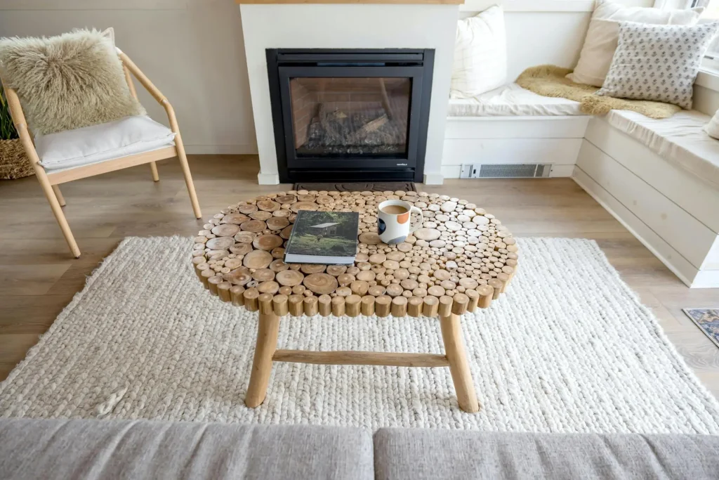 Bright and airy living room with natural wooden furniture, offering fresh interior decoration ideas.